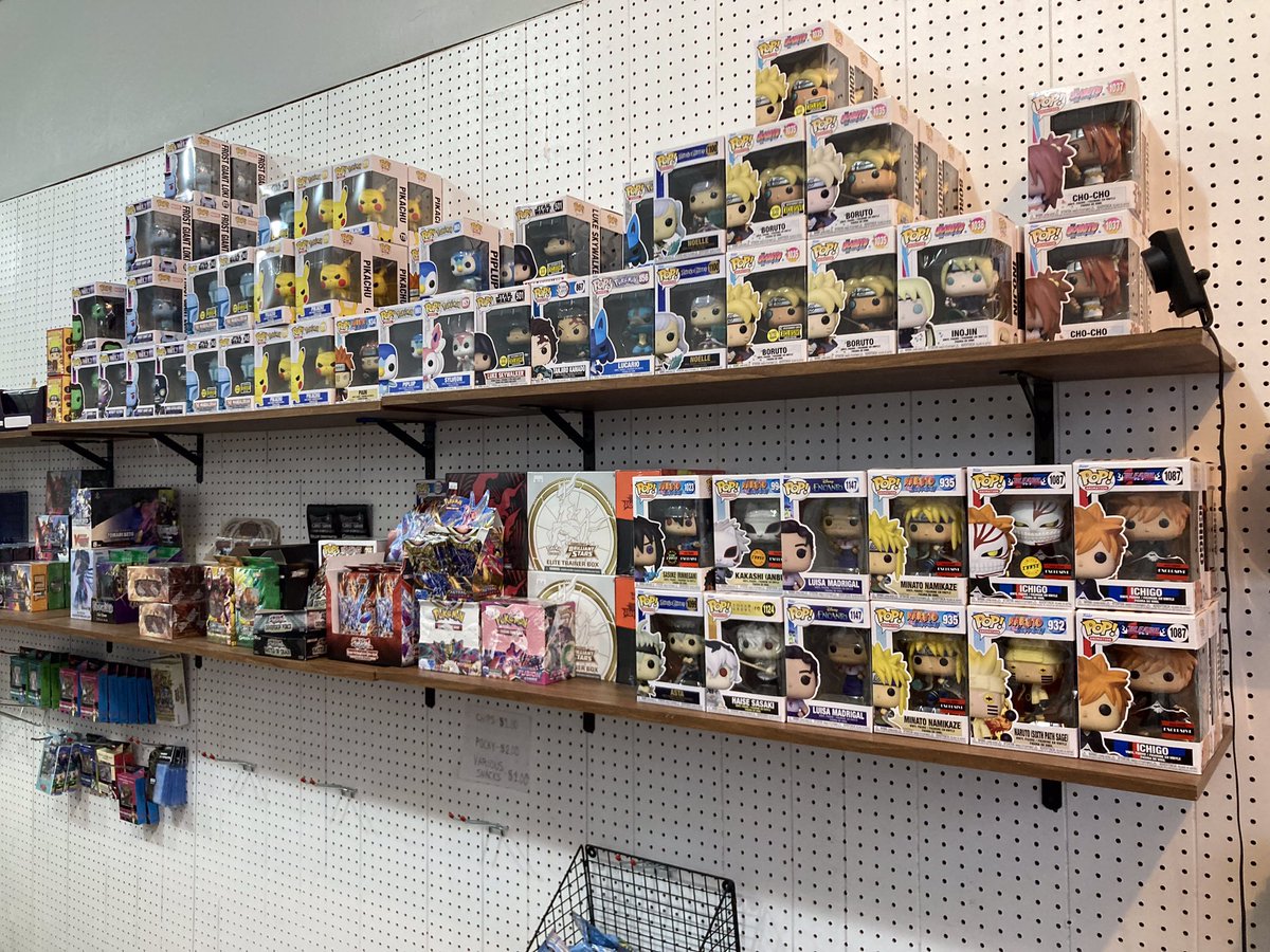 Emilio Griffin. Owner and Manager of Max Level Gaming. Originally an online store Emilio opened his up at his brick and mortar store at 2080 W. 65th St, in Cleveland one year ago. The store specializes in Flesh and Blood and Yugioh gaming products. Photos: December 3, 2022.