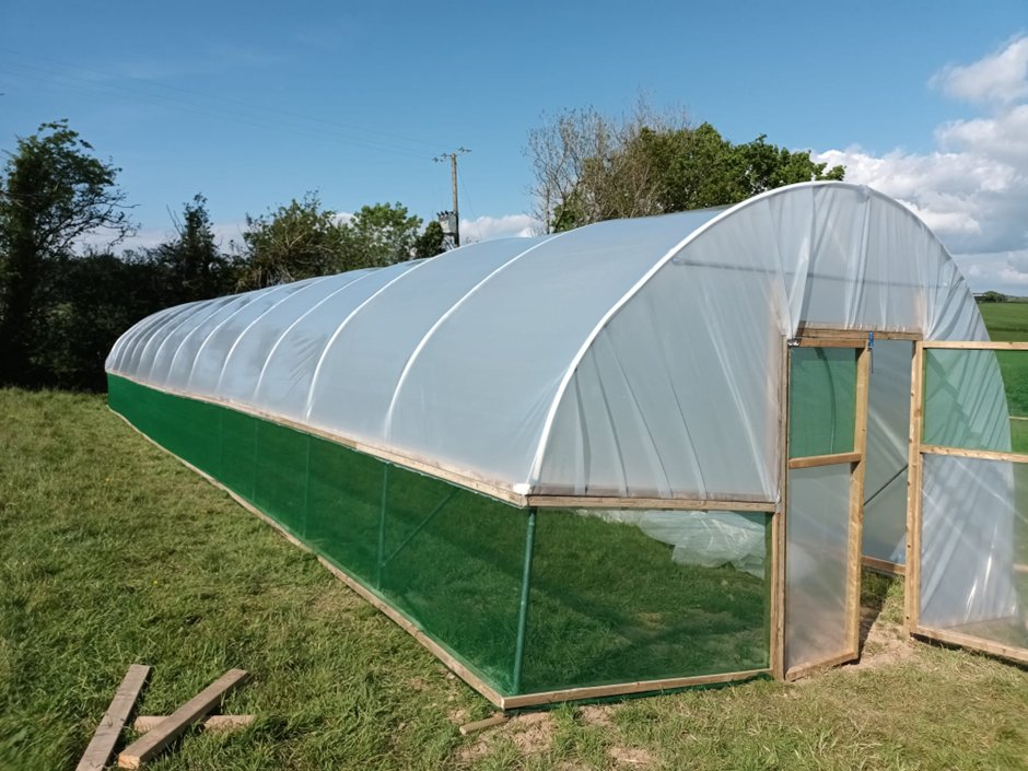 Then onto the polytunnel.... Again, purchased last year before we moved, we put this up ourselves. It measures 60ft x 14ft – and took 3 weekends to put up. The majority of the work was in the underground pole foundations to stop it blowing away. The rest was fairly easy to put up