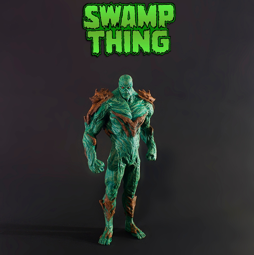 Real_Mike_R's tweet photo. 2 models set up for stream today, the @purakito Fred Flintstone and the @La_Calavera_3D Swamp Thing Statue. #SwampThing was filmed at the lake at the end of my street so this is a fun one for me. My homie @DerekMears played him in the DC series. I still owe him a ghost hunt.... https://t.co/KJhtj2AOfU