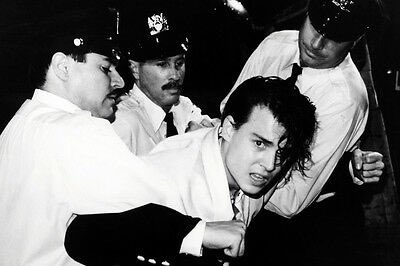 amberismother's tweet photo. We just gonna ignore all of these photos of Johnny Depp being arrested? Look at how violent this man is. 
#IStandWithAmberHeard
#JohnnyDepp https://t.co/vrd87Suos3