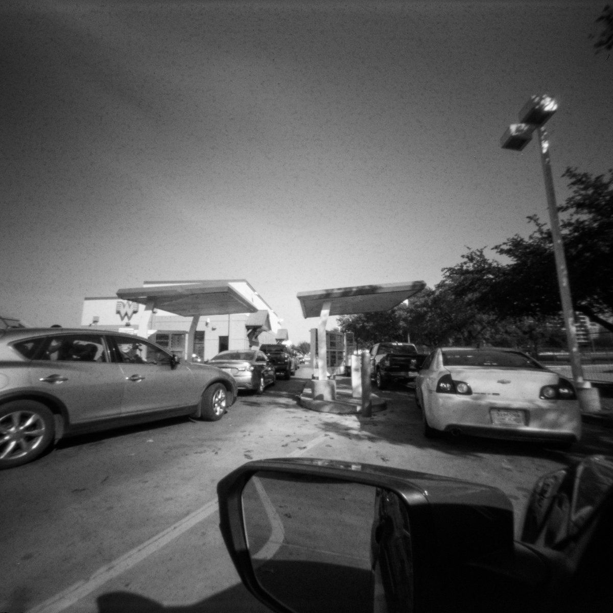 Somewhere doing my 2021 Christmas shopping with my 
@ONDUpinhole 6x6 camera. I took one pic per stop including Calloway's Nursery, @DonsUsedPhoto, @Target, and @Whataburger.

#pinhole #pinholephotography #filmtography #filmphotography #whataburger #target