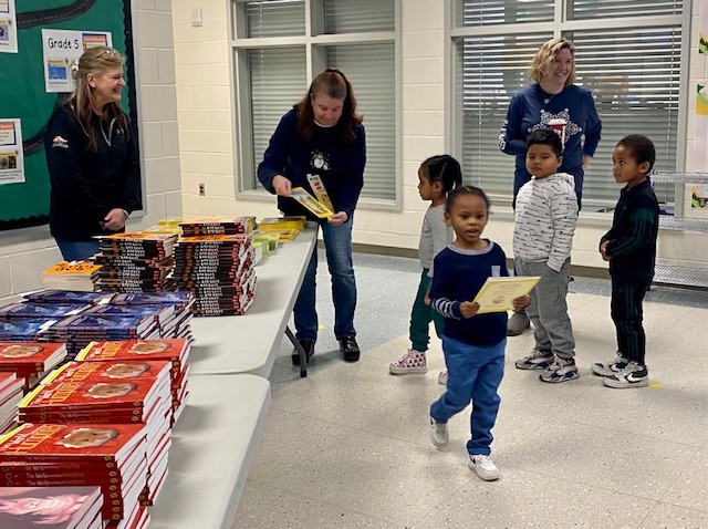 PAC and STA Charitable Legacy partnered with <a href="/UnitedWayCM/">UnitedWayofCentralMD</a> to deliver books <a href="/DundalkES/">Dundalk Elementary</a> for the holidays. It was a team event of handing out student-selected books along with a holiday bookmark.