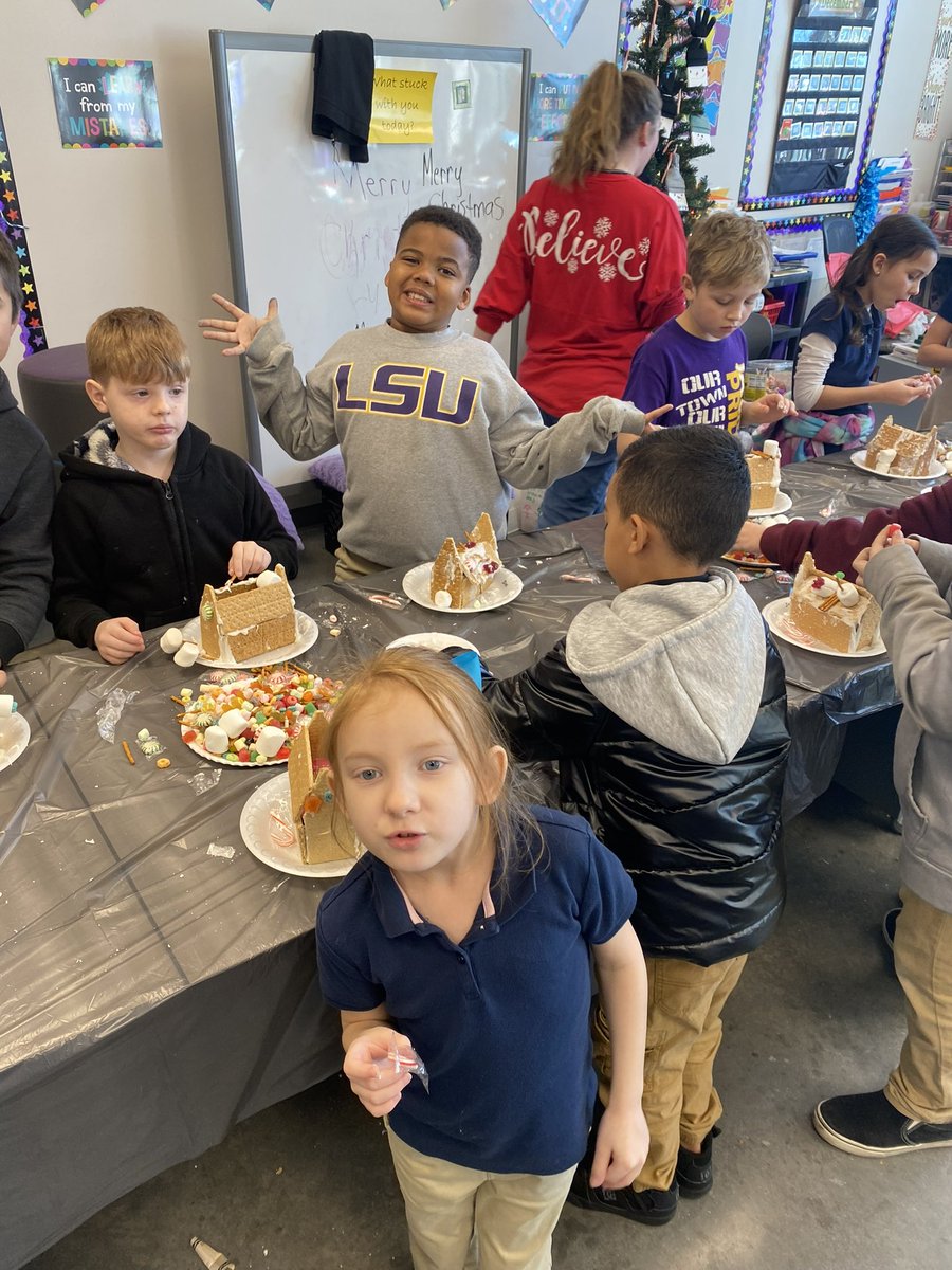 Second grade students made fabulous gingerbread houses last week! 💜💛🎄