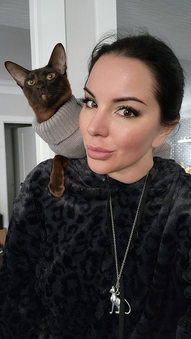 The holidays can suck but know what doesn't? Festive pet pics! My two goblins love sweaters and I have