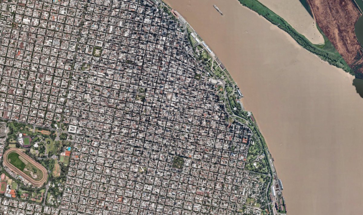 pushtheneedle's tweet photo. FIFA world champion Lionel Messi is from Rosario, Argentina, a place that is gridded, dense, and doesn't waste it's valuable waterfront real estate with stroads or highways https://t.co/XplIBbpLfS