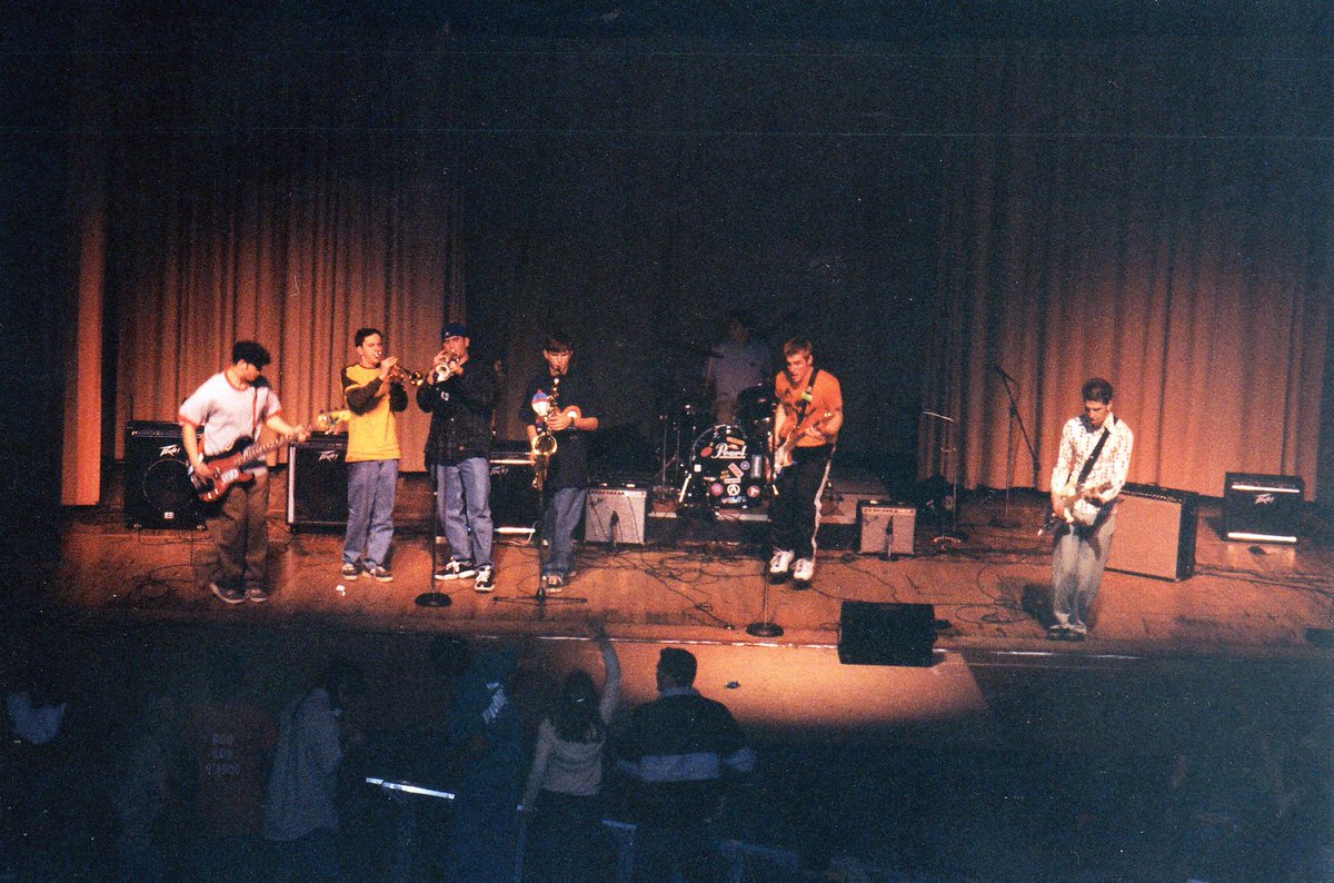 therealdpgang's tweet photo. 25 years ago we released our debut album Ain't Got None Monies. This photo is when we got a spot to perform at the Allegany High School variety show on Dec. 13, 1997 and rocked the house to release that album. We appreciate everyone who is still listening! Rock on! https://t.co/cZ9iGHLCR5