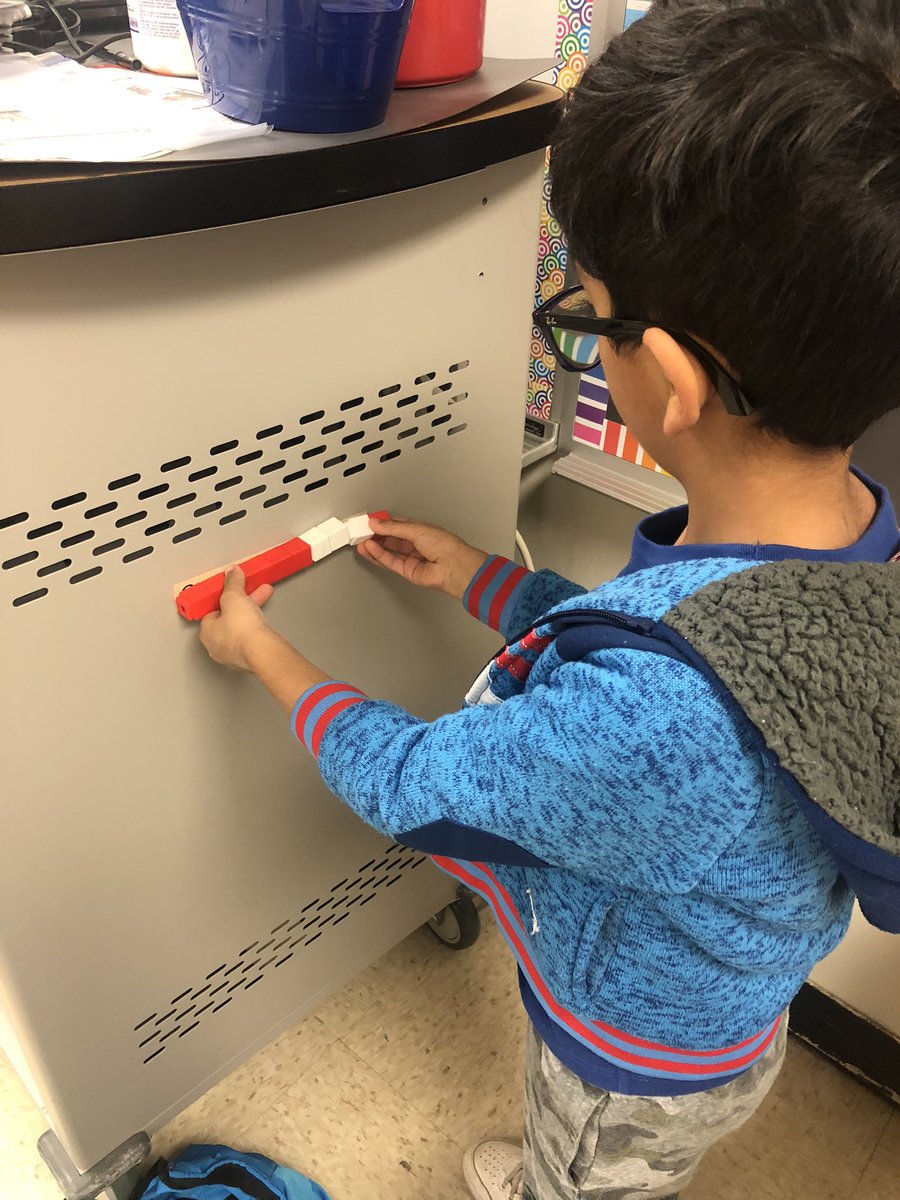 MrsGeorge_GES's tweet photo. Students at this math center reviewed measurement by hunting for tape around the room and then measuring the length using cubes. https://t.co/jfTPGJ3PGj