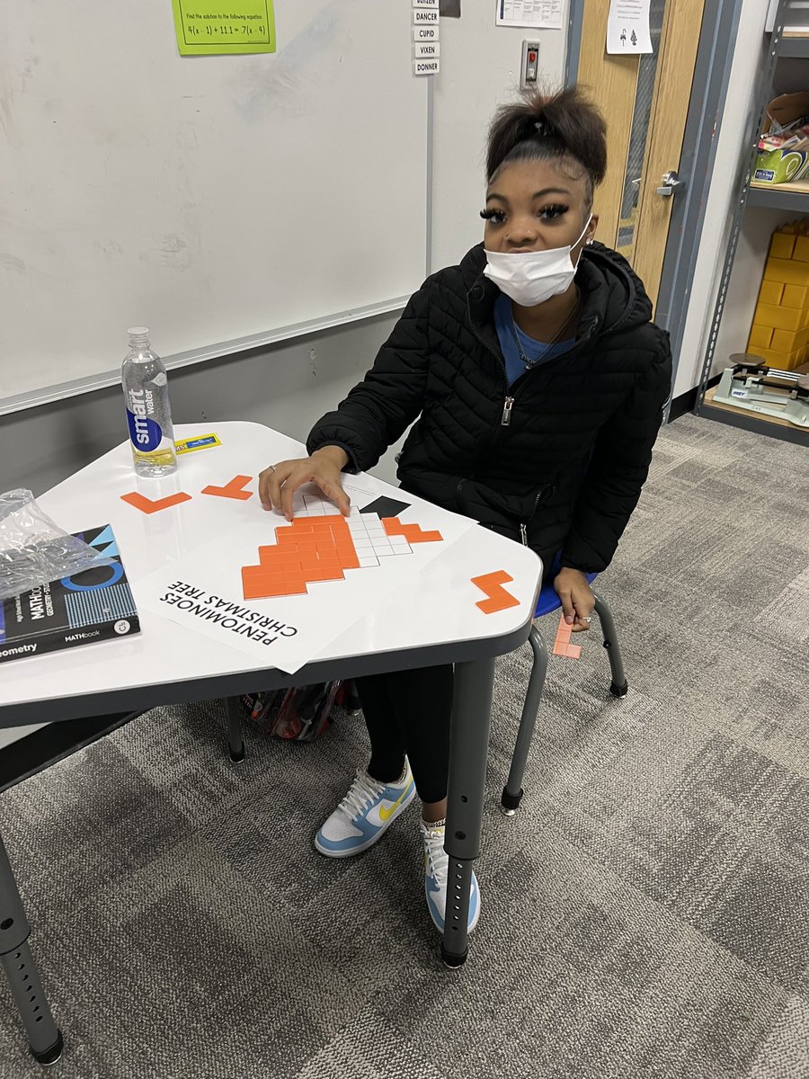JarushaG's tweet photo. My HS Geometry class @CASjackets worked on the Pentominoes Christmas 🎄 puzzle from @mathequalslove today in class before wrapping up some work. #brainengaged #mathisfun https://t.co/ODGB9eidQq