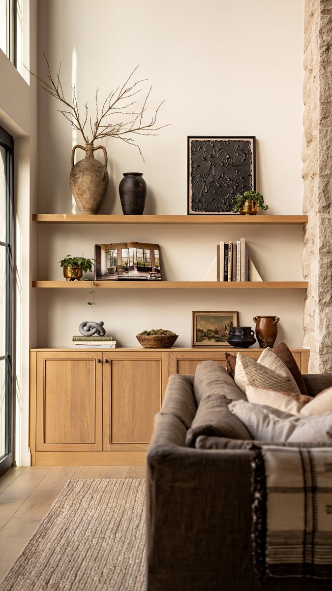 We love when our projects have amazing views to take inspiration from! From the large limestone stone fireplace, chocolate-stained reclaimed beams, and light &amp; airy hardwood floors, every detail was inspired by the waterfront and foliage on the land 🤎 #ProjectNewHouseOldCharm