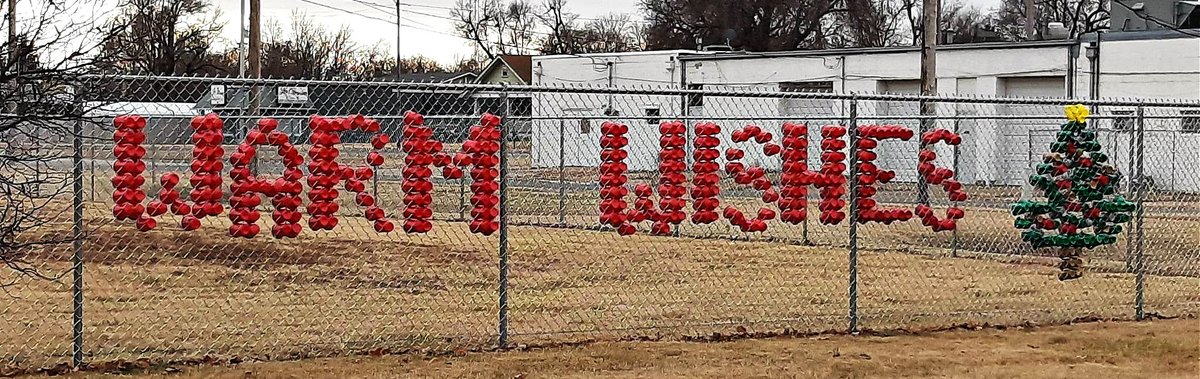 OppNow1's tweet photo. Amber Bohm's Elementary class wanted to share the spirit of Christmas with Salina!  The solo cup message is on the north fence facing Cloud street.  Warm wishes with a cute Christmas tree! Click on the picture to see the full message. ♥ #WaytoGoMrsBohm  #TistheSeason #LifeisGood https://t.co/NdfVK5lliJ