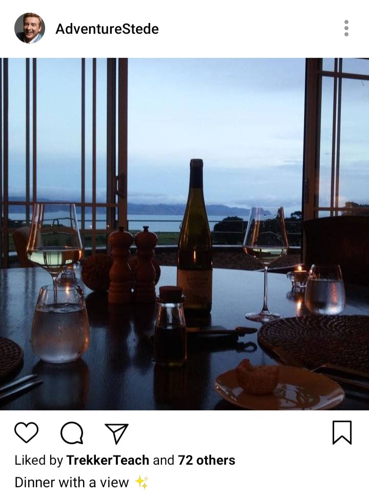 Stede's IG. Photo of table at hotel, wine glasses, plates. Overlooking a bay. Caption reads "Dinner with a view" 