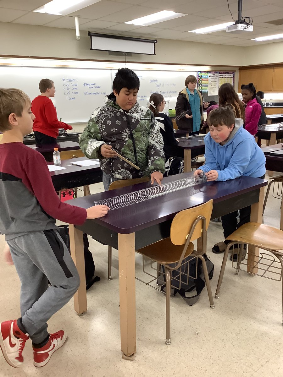 In science with Ms. Cattarozzle students used slinkies to model and measure different wave properties like amplitude and frequency to observe how waves can carry different amounts of energy. #wildcatwow #wawmproud #slinkyscience #scienceisfun #science