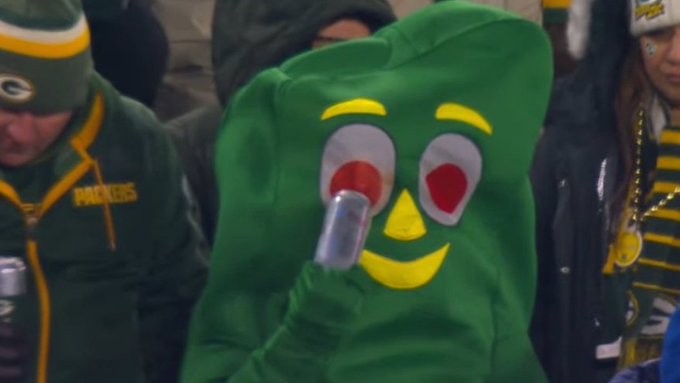 sportingnews's tweet photo. Gumby is not only drinking at Lambeau Field, but he's drinking through his eye 😂 https://t.co/rryl1qhoky