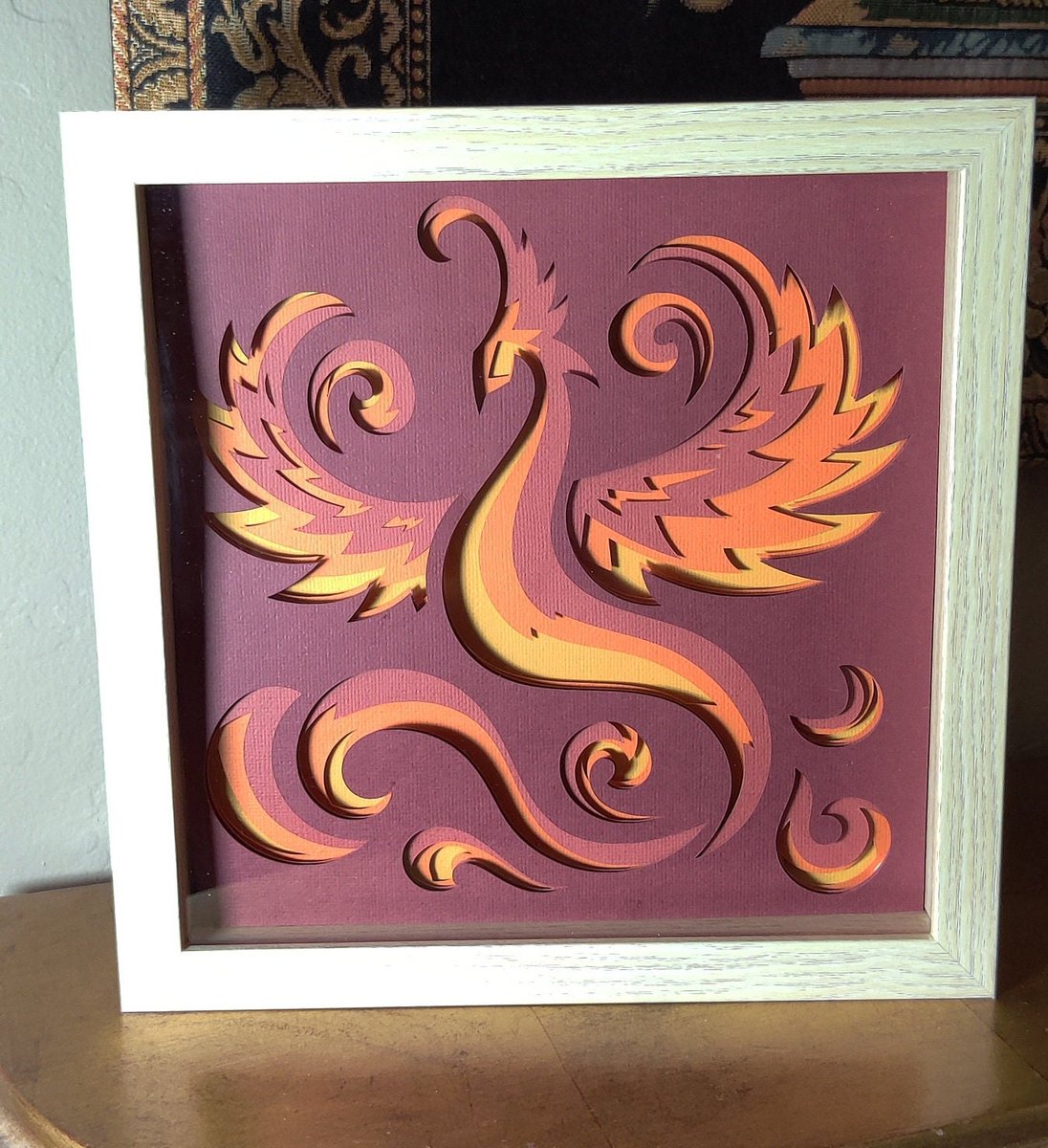 casady_sandra's tweet photo. Excited to share the latest addition to my #etsy shop: Framed Phoenix Mandala Paper Art, Phoenix Shadowbox Paper Art, Shadowbox Mandala, 3D Mandala Layered Paper Art, Papercut Layered Mandala https://t.co/Ml1p5kGUIi #brown #orange #framed #entryway #contemporary #walld https://t.co/OAu7gbHvRK