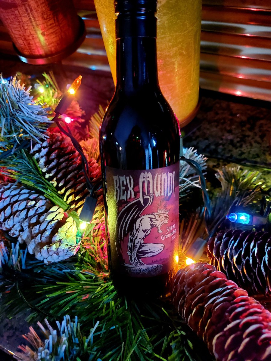 #AdventCalendar #19 is a red blend of Shiraz and Grenache from France. Big bold red. Fruit aromas, deep red color, slightly sweet. An all around 🏆  Hope Santa doesn't see the label because I bet he would leave me a lump of coal. Thank you Rex Mundi we really enjoyed this.