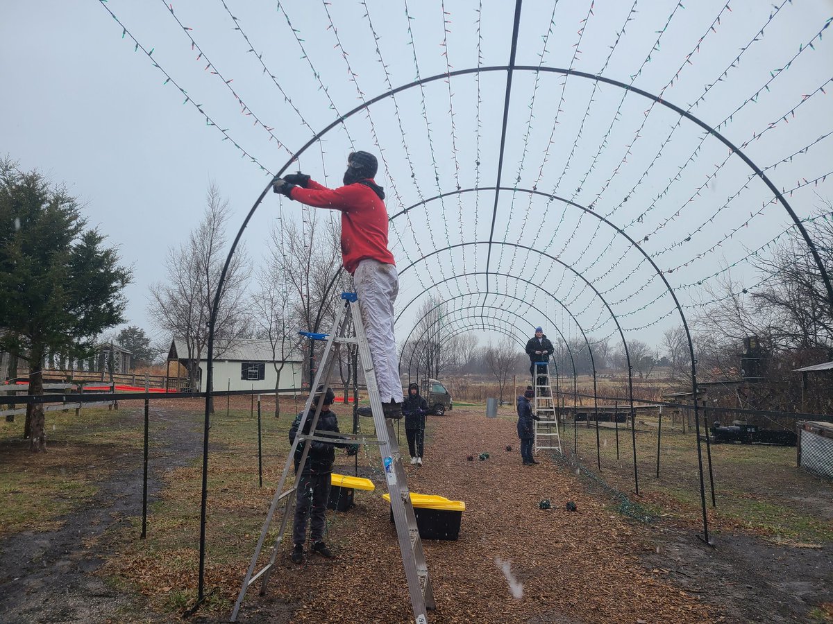 ONBsblBooster's tweet photo. The fellas from @EaglesOlathe were back at work again with KC Pumpkin Patch helping take down their spectacular light show.  A group of 25 to 30 players, parents, and coaches worked well through the elements! https://t.co/zyNg0oPMAw