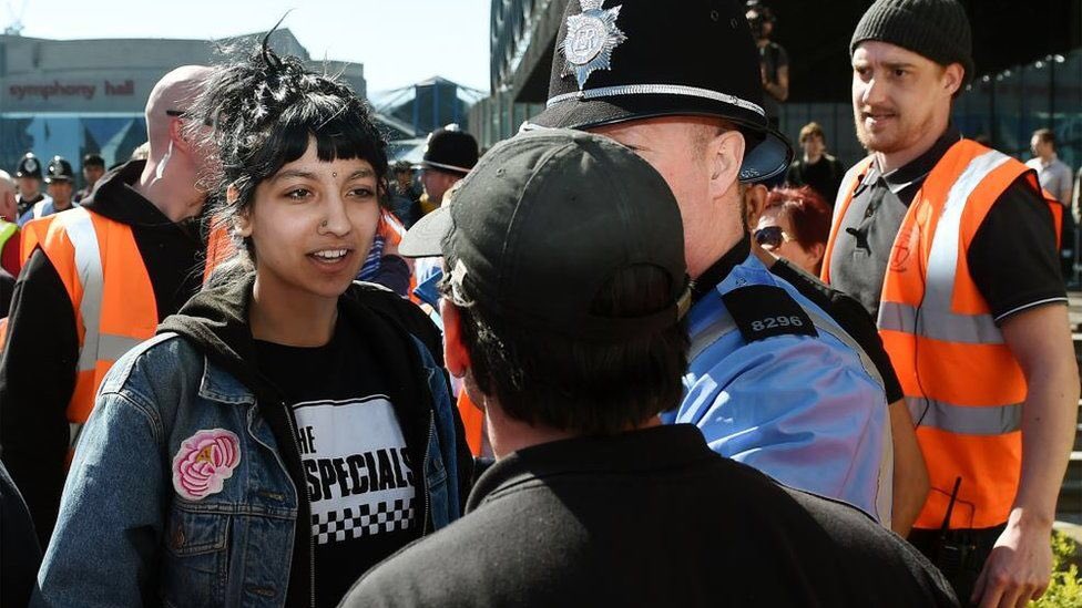2017: 18yo Saffiyah Khan facing off with the leader of the islamophobic English Defence League whilst wearing a Specials t-shirt. Terry Hall said ‘It felt like a vindication of everything the band had set out to do.’