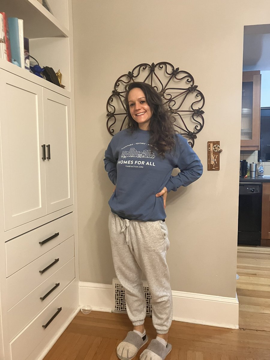 PressmanGillian's tweet photo. Squeee loving my @yimbyaction Homes for All sweatshirt. (Cat slippers not included unfortunately) We are giving to donors of $200 or more! https://t.co/JrZToVrXjJ https://t.co/XVsgrXJIFw