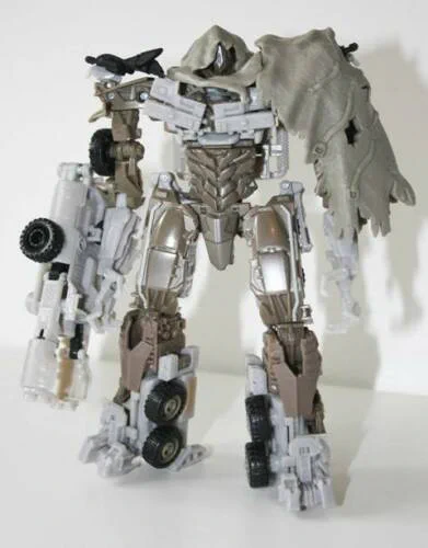 Oh yeah, should've probably mentioned that this design is a combination of this Dark of the Moon figure and Prime Megatron 