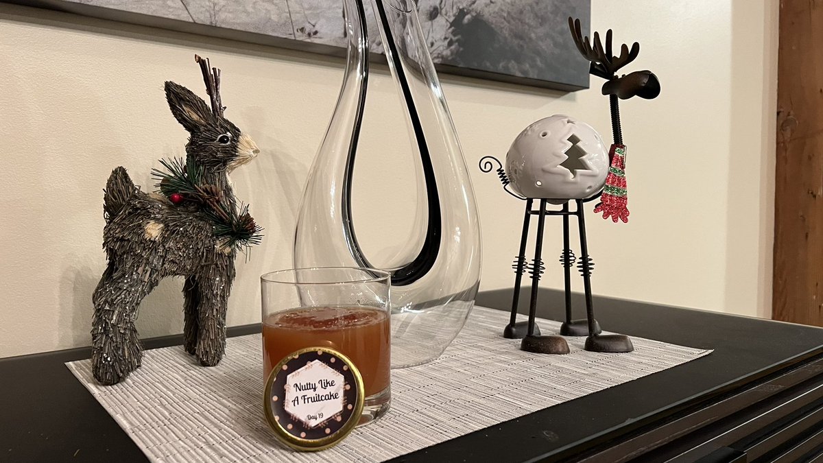 Day 19 Advent Cocktail with my intentionally corny Christmas decorations.