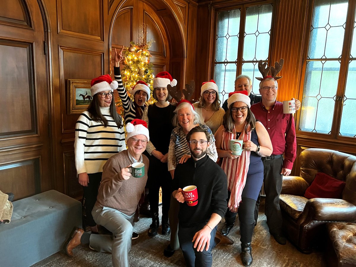 IlluminAge's tweet photo. Happy holidays from your friends at IlluminAge Communication Partners! Left to right, front to back: Dennis, Asher, Lindsey, Diane, Elly, Connie, Nancy, Mary, Aaron, John. Not pictured: Amanda, Ryan, Bonnie and Lynn. https://t.co/em742ewWq5
