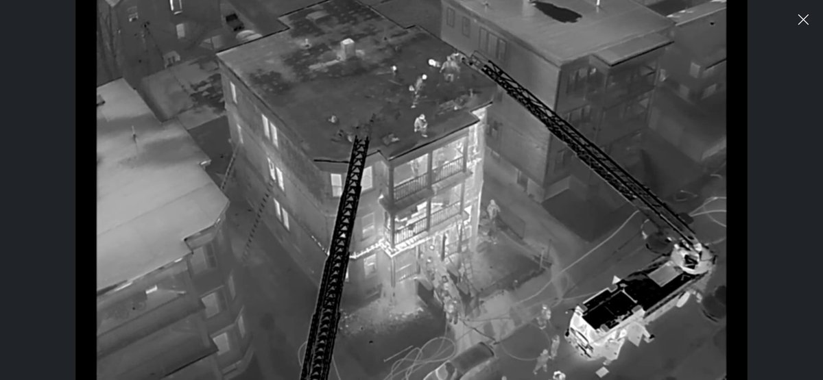 BostonFire's tweet photo. All companies working at 2nd alarm fire @ 74 Mora St Dorchester. The 3 story wood frame has fire on all floors. Several residents rescued https://t.co/83hhRcGNJk