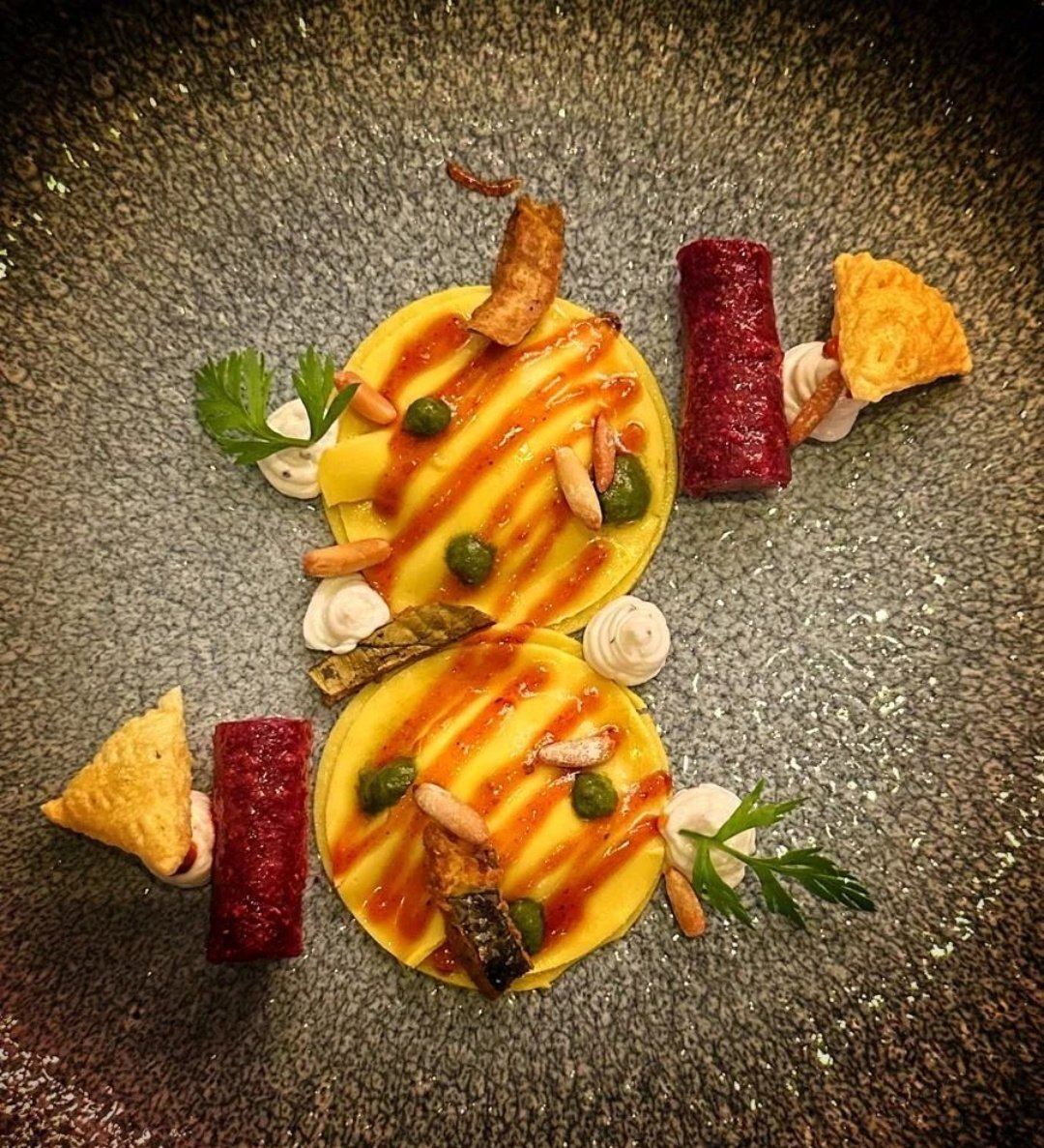 #KhandviRavioli... a dish we first served in 2014 at a pop up….then it featured in Indian accent cookbook….Inspired from #Gujarat….filled with masala goat cheese…served with beetroot, crispy patra, Rice puffs and pine nuts.... New menu at Indian Accent Delhi #food #foodie