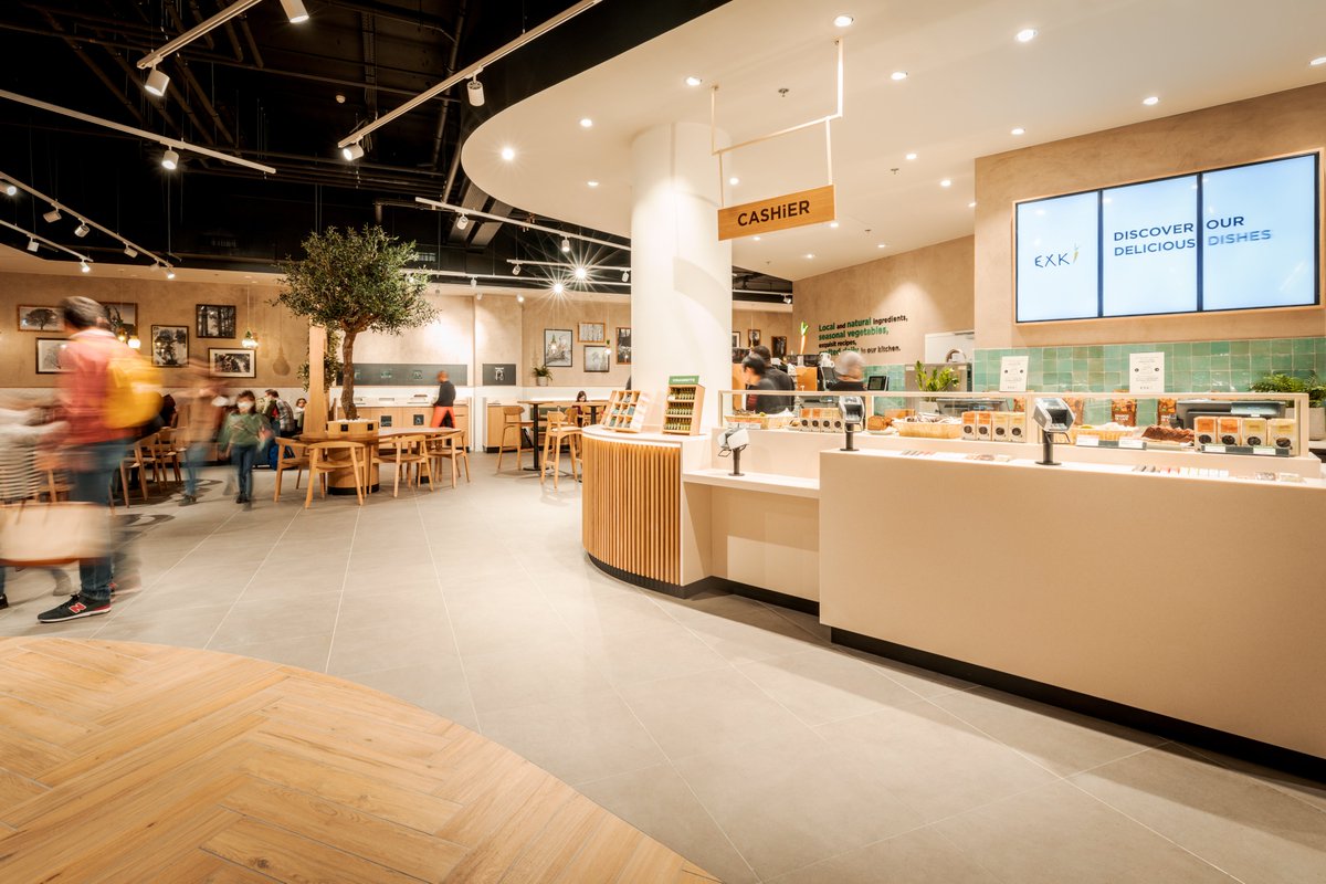 BrusselsAirport's tweet photo. Happy to announce the opening of a new #EXKi in our departure hall! 🥳 With its #organic &amp; #local ingredients, it fits seamlessly into the #sustainability picture. The menu follows the seasons and caters for everyone’s needs. 🧡 See you there? #brusselsairport https://t.co/GhcIepLmAG