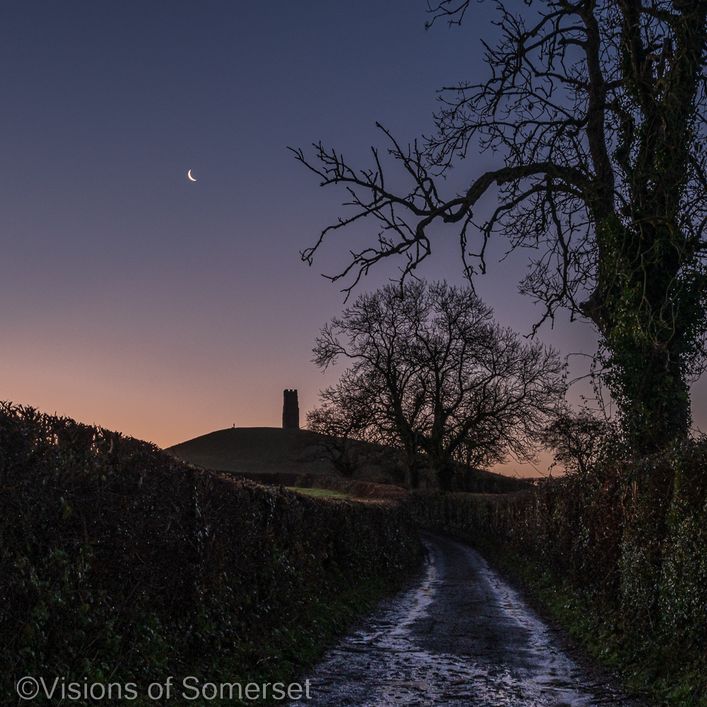 Glastomichelle's tweet photo. The moon over Glastonbury Tor, taken about an hour before sunrise this morning. https://t.co/KzLCshYstR