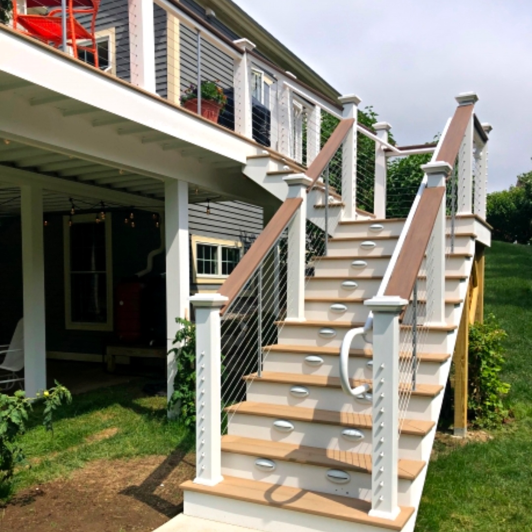 Composite Stair Railing with CableRail is an exquisite look for #exteriorstairs. The Cable Feeney CableRail with TimberTech posts include aluminum Intermediate pickets to prevent cable deflection between posts. Does your home have outside stairs? #excelsiorlumber #njhomes