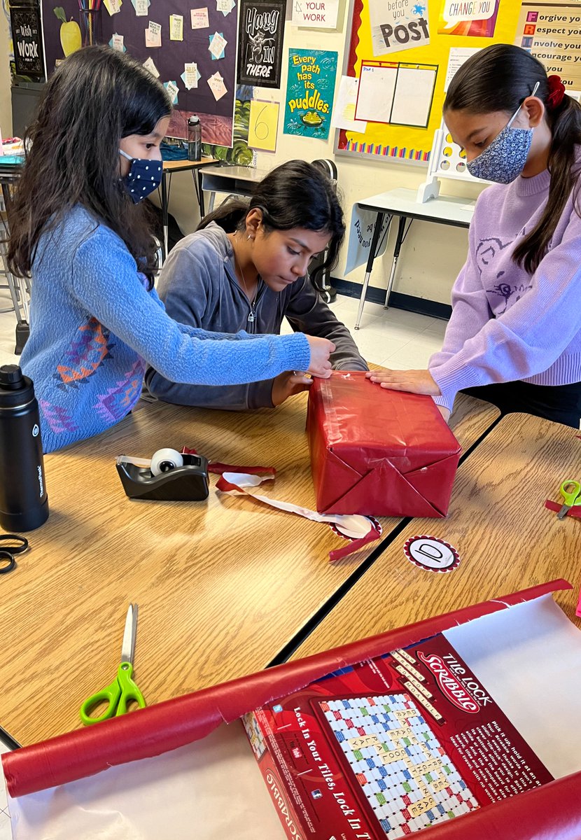 SBSDXRDS's tweet photo. At Crossroads North recently, Ms. Blayne and Ms. Colaner taught their students how to wrap presents. Meanwhile, students in Ms. Bock and Ms. Perillo's class learned how to play a game of dreidel. https://t.co/6HLYrfYq3K