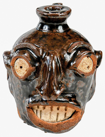 AntiqueDigest's tweet photo. Pre-1870 4 3/8" high face jug attributed to Lewis Miles’s Miles Mill manufactory, Edgefield District, South Carolina sold for $39,360 (est. $35,000/45,000) at @BrunkAuctions https://t.co/QgMq5RNBdT #art #folkart #antiques #antique #SouthCarolina #facejug #Edgefield #pottery https://t.co/3UZYhMzCg4