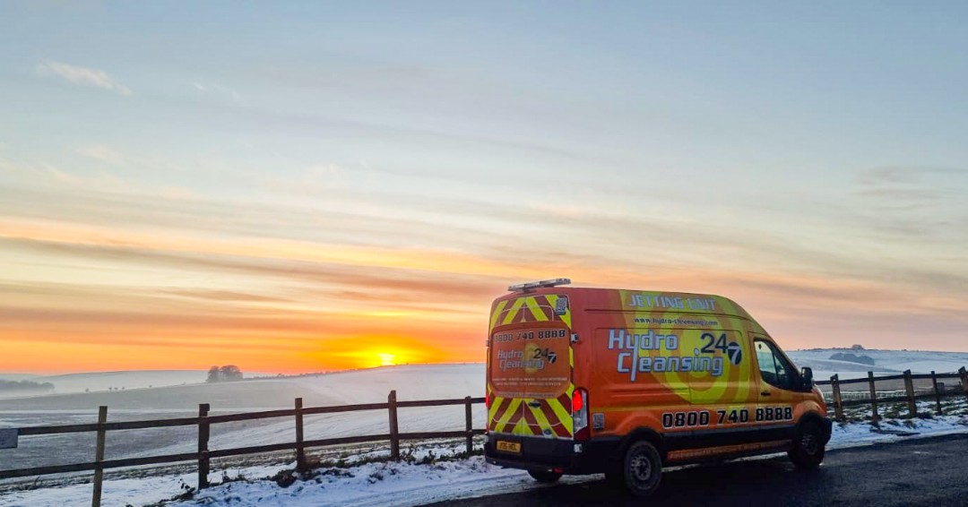 hydrocleansing's tweet photo. Our jetting unit team was hard at work even as the sun set on the horizon. Here's a beautiful shot of our team in action. #sunset #jetting #teamwork #hydrocleansing #jettingunit #redsky #snow #environmentalsolutions #wastemanagement https://t.co/hIsIbHDVWP