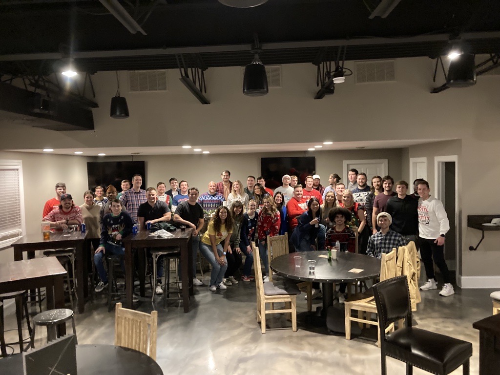 Schellman's tweet photo. 'Tis the season for an #UglySweater party and a white elephant gift exchange! Our Columbus #SchellmaNators know how to celebrate together this #holiday season. https://t.co/UVCsUKx1Ok