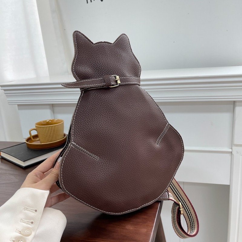 ShineBoutiqueD's tweet photo. Excited to share this item from my #etsy shop: Cat Bag, Unique Bag Purse, Women's Messenger Bag, Cute Cat Shoulder Bag, Cat Lover Gift, Cat funny gift, Cat Themed Gift, Cross Over Bag #catbag #catthemegift #catlover https://t.co/kpgt1e7Hlr https://t.co/weZ7WdIb8o