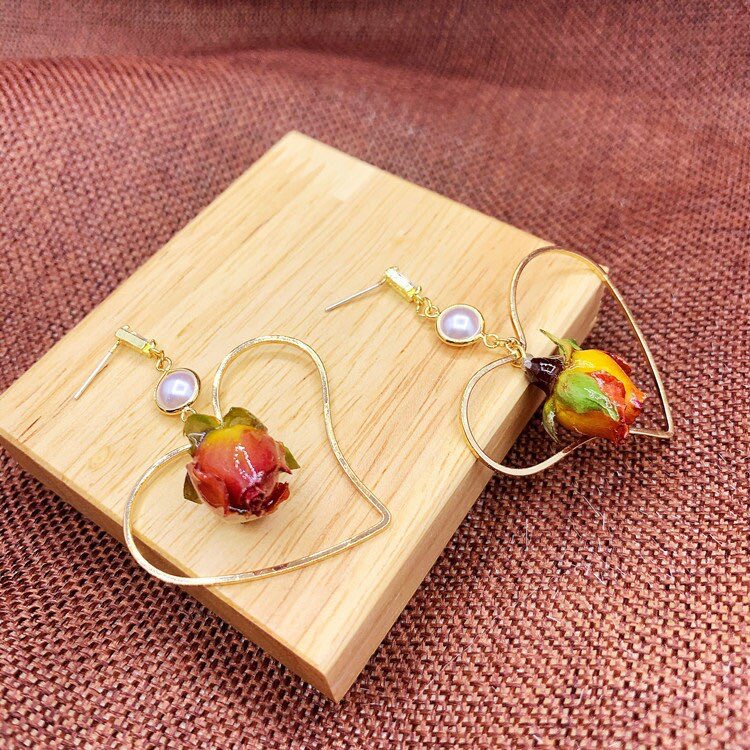 ShineBoutiqueD's tweet photo. Excited to share this item from my #etsy shop: Rose Earrings | Handmade Jewelry Gift Idea | Rose Bud Pressed Dried Flower |Romantic Earrings | Flower Earrings | Floral Jewelry | Fairycore #artdeco #driedflowerearring #rosebud #flowerjewelry https://t.co/bn7Mb14gZZ https://t.co/rCcnhosExu