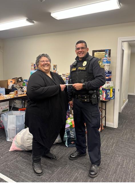 On Day 20 of our #25DaysofKindness, we made an $800.00 donation to the fuel assistance program at the Holden Congregational Church. (We also made a little gift to our wonderful friend, Pastor Linette George, picture here receiving the funds from Lt. <a href="/Ed_Benjamin79/">Eduardo Benjamin</a>.)  👍