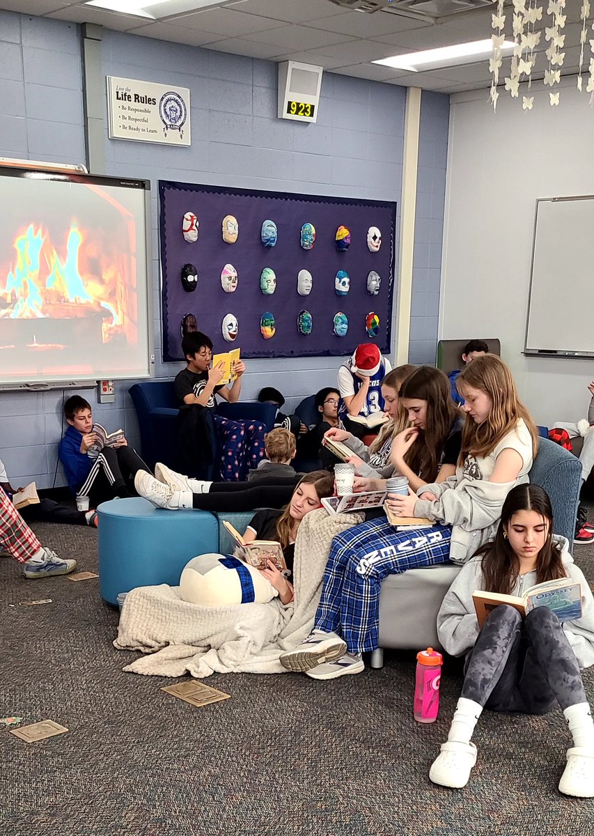 Enjoying Cozying Up and Reading a good book by the fire with some cocoa in the LRC today. Thanks Ms.Milos and Mrs.Malecky!! @RTMS_LRC