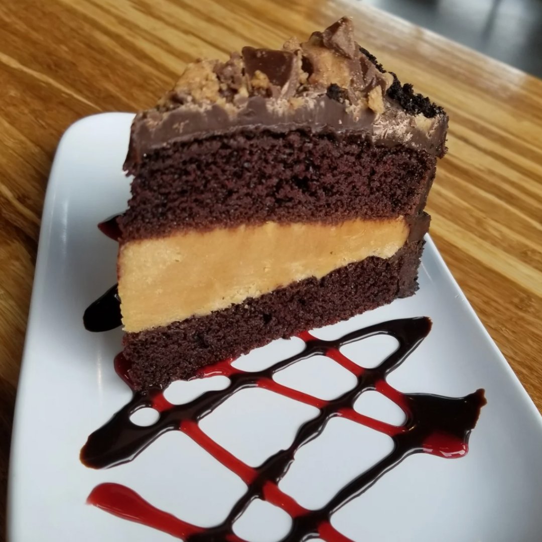 We hope you saved room for dessert! 😋 Peanut Butter Chocolate Cake 🥜  Two layers of moist chocolate cake, creamy peanut butter filling & topped with peanut butter cups. See more sweets online!

#pnwrestaurant #visitwashington #camaswashington #pnwcraftbeer #craftbeernerd