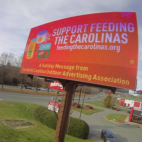 This holiday season, NCOAA is joining <a href="/FeedCarolinas/">Feeding the Carolinas</a> efforts to work to solve hunger, raising awareness with our members’ network of digital billboards across NC.  Visit feedingthecarolinas.org/locations/ to find your food bank, or make a donation, and help those in need. #OOH #nc