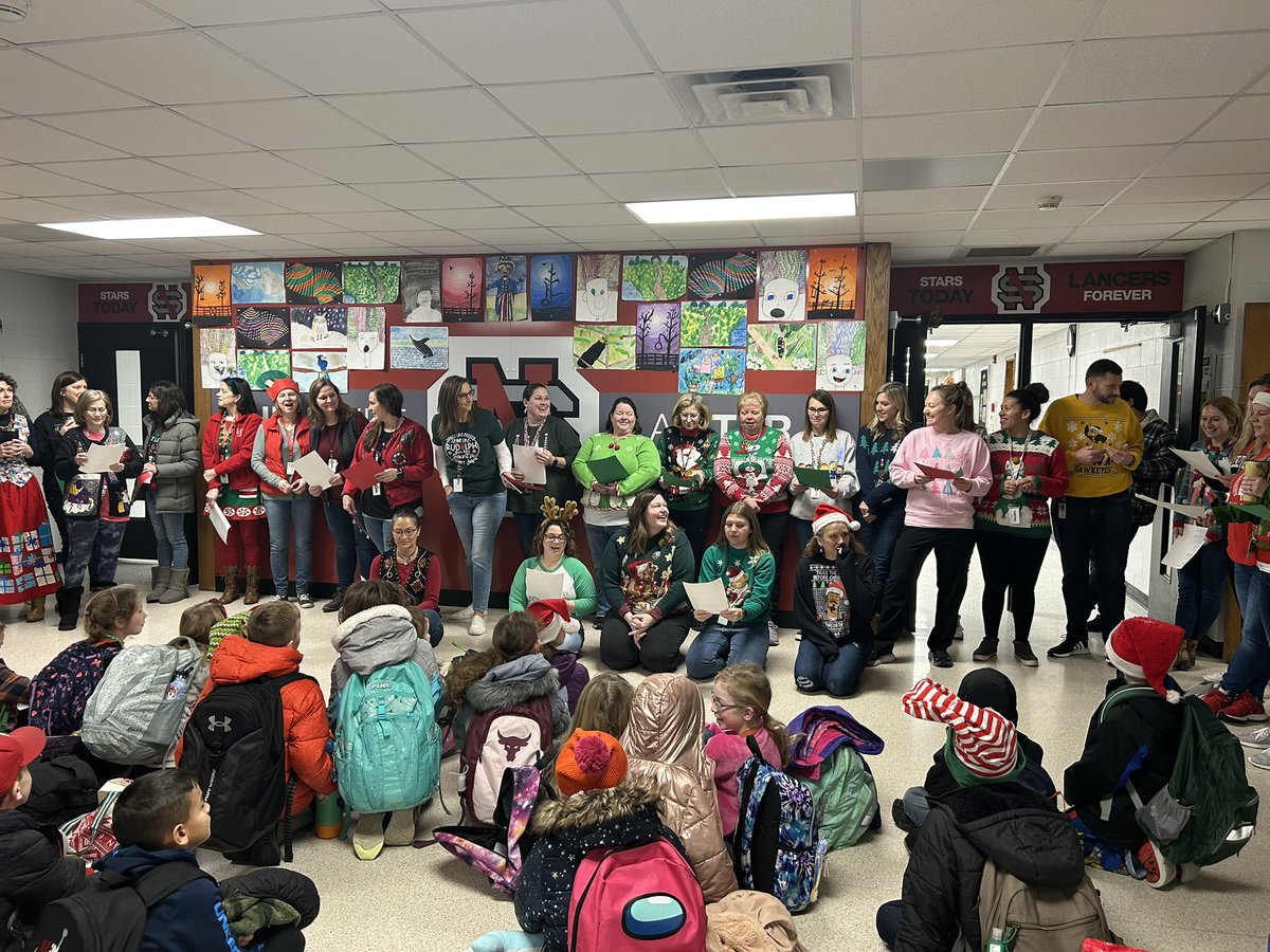ASCounselor's tweet photo. So much fun today!  Caroling in the lobby, a Santa sighting, the Polar Express and a door decorating contest.  Have a safe and happy winter break!!  Get ready to rock some SEL in the new year 😁
@NorthScottASES 
@NorthScottCSD https://t.co/5YWOvCy7cE