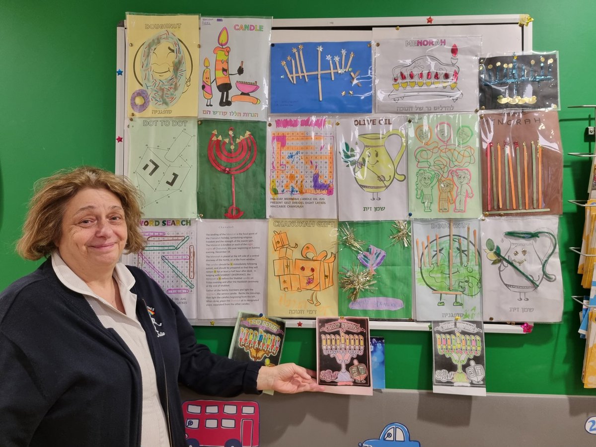 One of our Outpatient team members with the board she created for Hanukkah. Julie has been teaching our paediatric patients all about the festival and they have had great fun colouring in their Menorah pictures. 🕎 Happy Hanukkah from everyone in Stanmore OPD at the RNOH.
