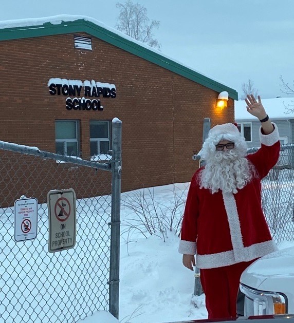 camecocommunity's tweet photo. Cameco is proud to support Rise Air’s Santa in the North campaign, which delivers gifts to children in northern communities for the holidays. As part of the campaign, our community liaisons joined Santa to deliver gifts at schools. #santainthenorth https://t.co/eTYwWnkJrz