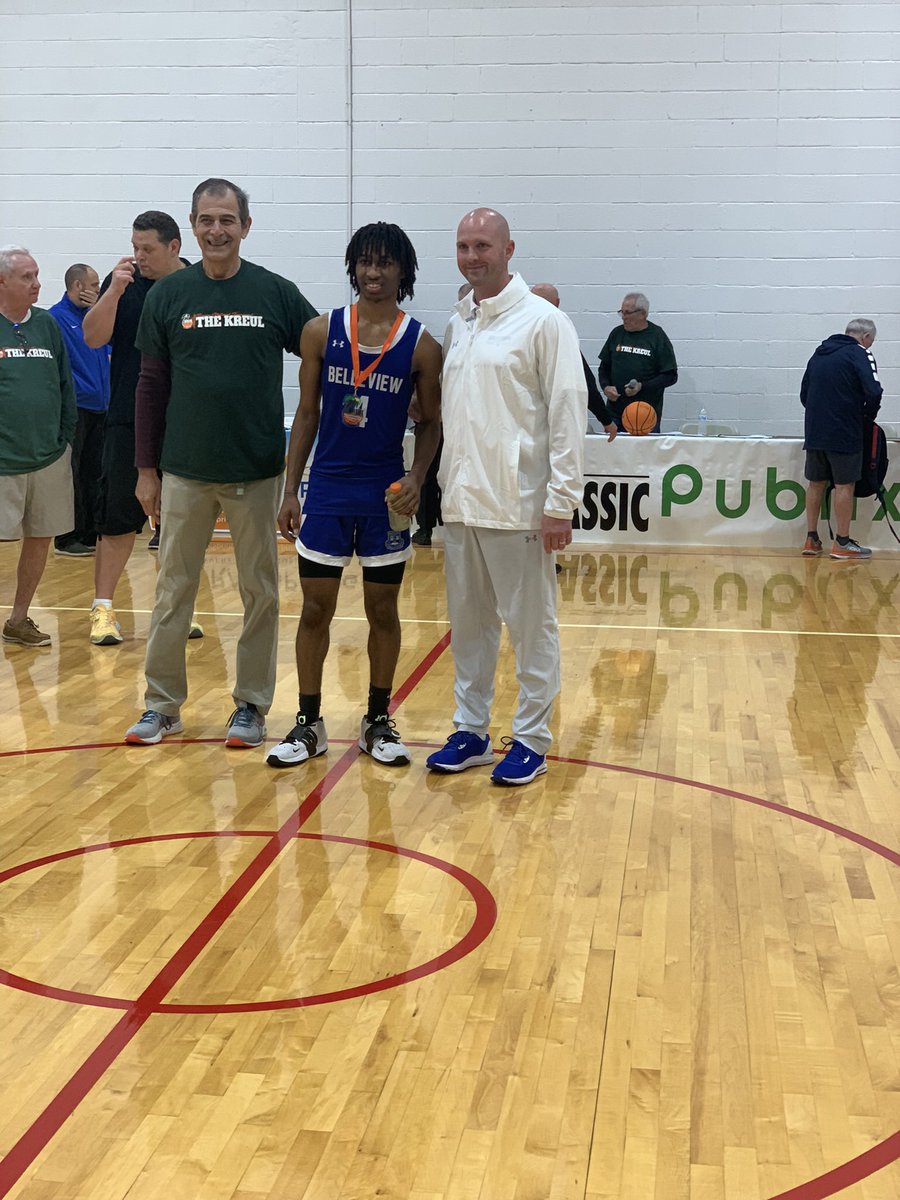 Senior Cori Johnson being awarded a medal for the all tournament team at the Kreul Classic this afternoon, finishing with 20 points.