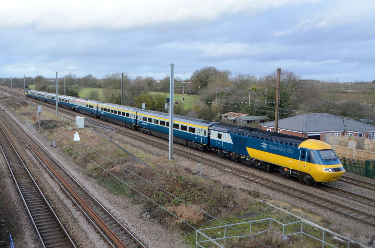 MrDeltic15's tweet photo. On This Day 2019 and the LNER HST Farewell charter with 43112 & 43006 and rake of matching Blue/Grey Mk3s passes Marholm heading for London Kings Cross in a scene that could almost be from the 1980s @LNER @railcamlive @RailwaysToday @125Group #LetsGoRoundAgain #HST https://t.co/9wNTlsAnZj