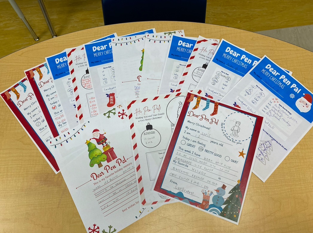 gp_palliative's tweet photo. Mrs. Bauer invited us into her Grade 7 Leadership Class at Alexander Forbes yesterday to educate her students on building a compassionate community and wrote Christmas Pen Pal letters! https://t.co/YoQh3ck44b