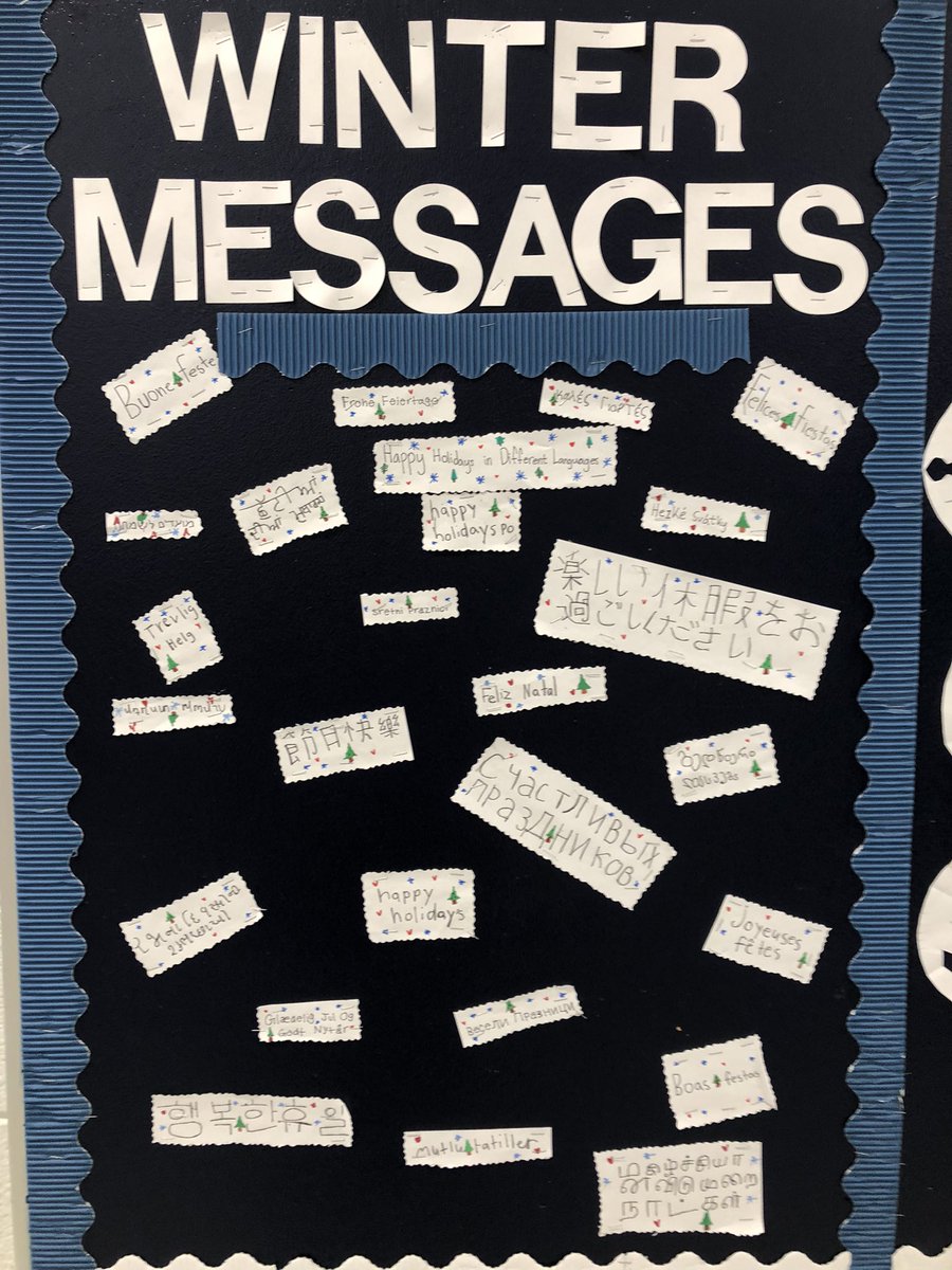 Student-led bulletin board group brightened the hallway w/ a wintry mitten tree full of colorful mittens! Buddies in gr1 &amp; gr3 created the mittens. Holiday greetings in many languages carefully researched by gr5 Ss for this display. <a href="/mbernal_DrB/">Michelle Bernal</a>