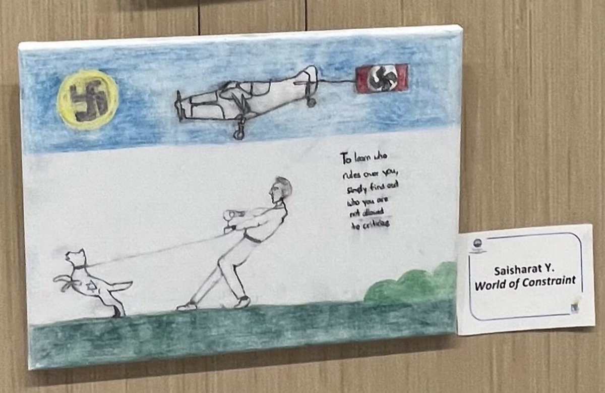 StopAntisemites's tweet image. A grotesque piece of antisemitic "art" is being displayed at the Tampa Airport (@FlyTPA) 

A Jewish Star of David adorns a leashed dog while swastikas are displayed with "To learn who rules over you, simply find out who you are not allowed to criticize."

HOW was this allowed?!