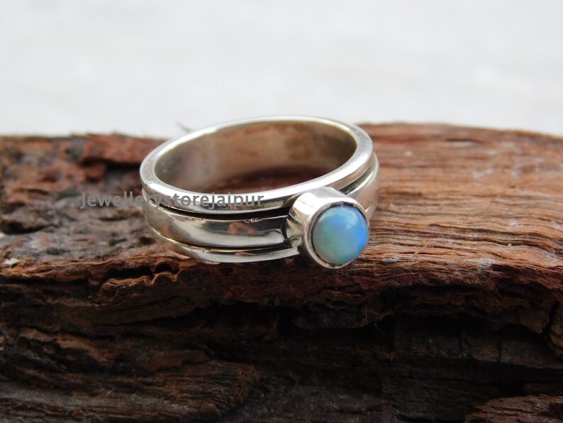 etsy.me/3hJDRry
#Ethiopian  #Opal  #Ring  #OpalRing  #Anxiety  #reliefRing  #meditation  #ThumbRing  #anxietyjewelry  #statementring  #Minimalistring  #spinningring  #Spinner  #Fidget  #giftring  #fiddle  #Opalspin  #jewelry  #giftformom  #ringforher  #ringformen  #ringe
