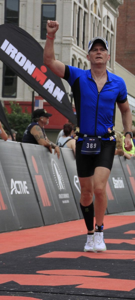 JeffWillmann's tweet photo. @IRONMANtri Finishing my first Ironman 70.3 in Sandusky, Ohio after being diagnosed with stage 4 cancer in 2016. Never quit. https://t.co/p4d91LA94K